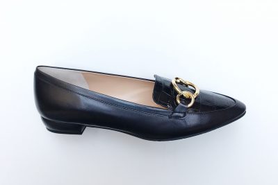 Mocassino da donna con accessorio in pelle pitonata e pelle nera € 169,90